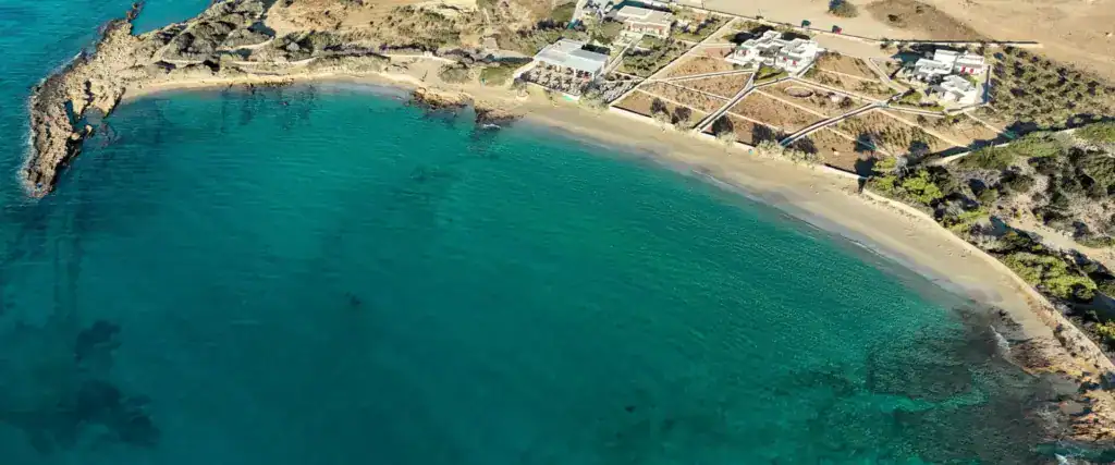 Aerial drone view of Fanos Beach in Koufonisia island with turquoise sea and soft sand