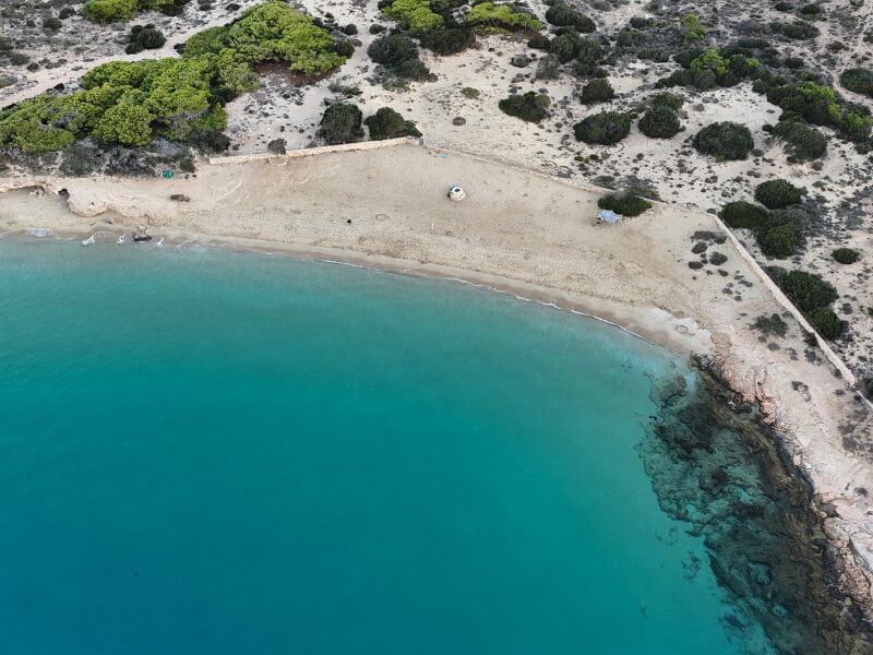 Italida Beach in Koufonisia — small sandy cove with turquoise waters